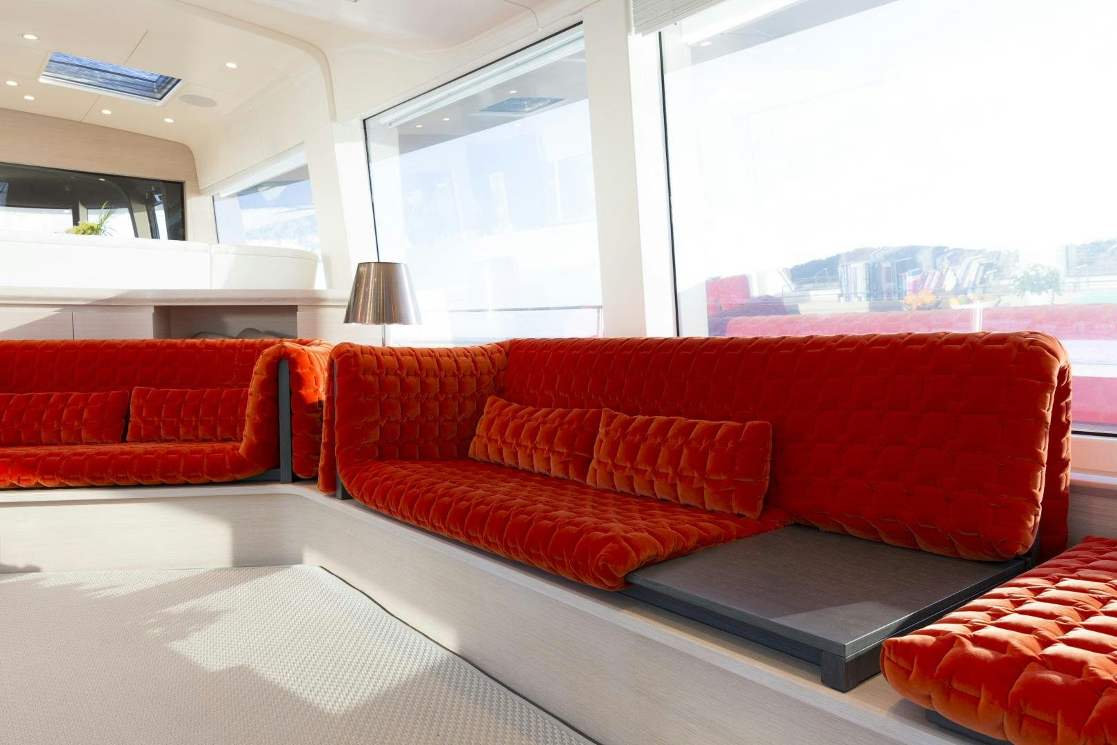 a couch in a room aboard BILL & ME Yacht for Sale