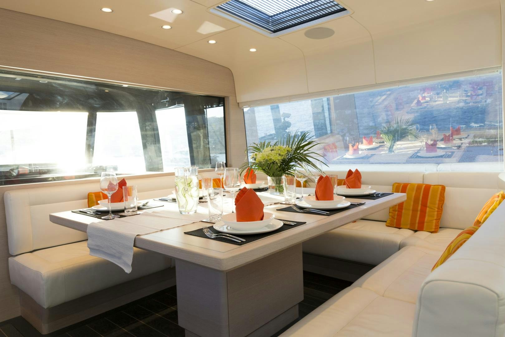 a table with candles on it aboard BILL & ME Yacht for Sale