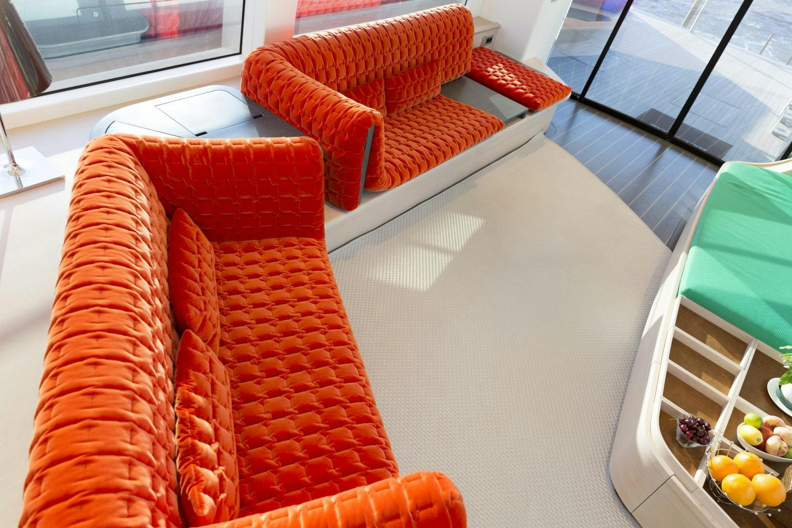 a group of orange wrapped food items on a table aboard BILL & ME Yacht for Sale