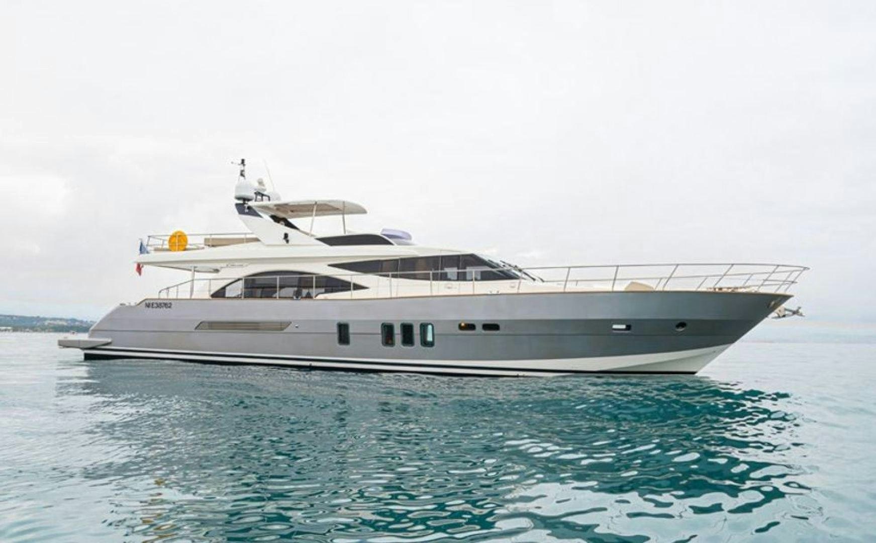 a white yacht in the water aboard PASSION V Yacht for Sale