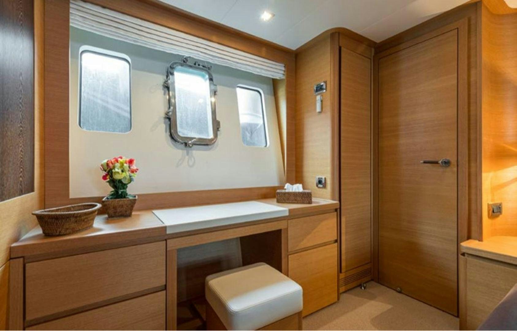 a bathroom with a sink and a toilet aboard PASSION V Yacht for Sale