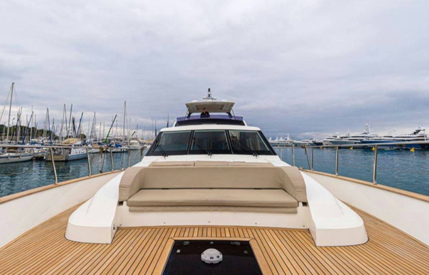 a boat on a dock aboard PASSION V Yacht for Sale