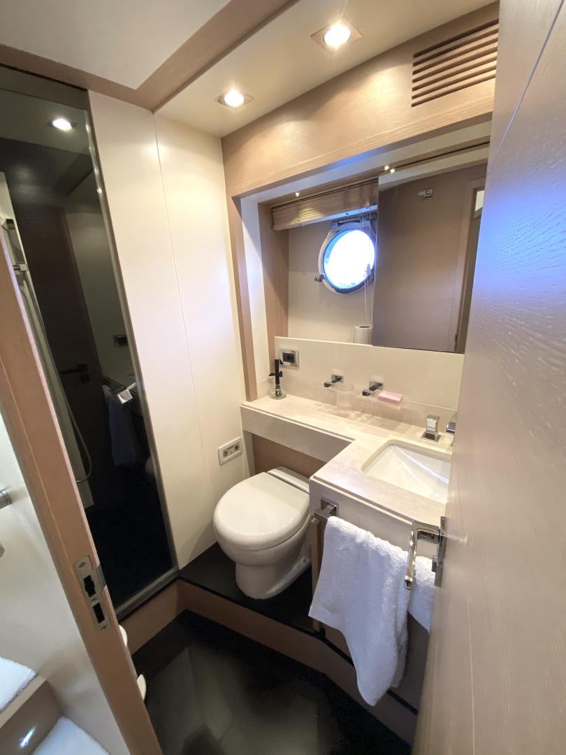 a bathroom with a sink and a toilet aboard THOR Yacht for Sale