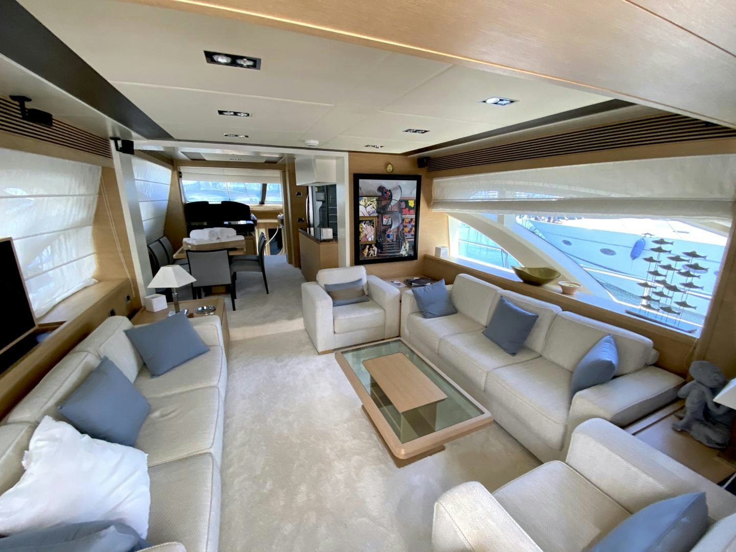 a living room with a large window aboard THOR Yacht for Sale