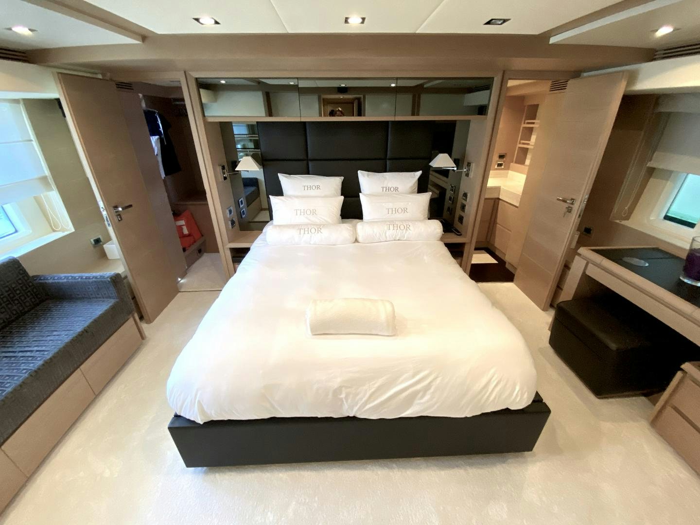 a bed in a room aboard THOR Yacht for Sale