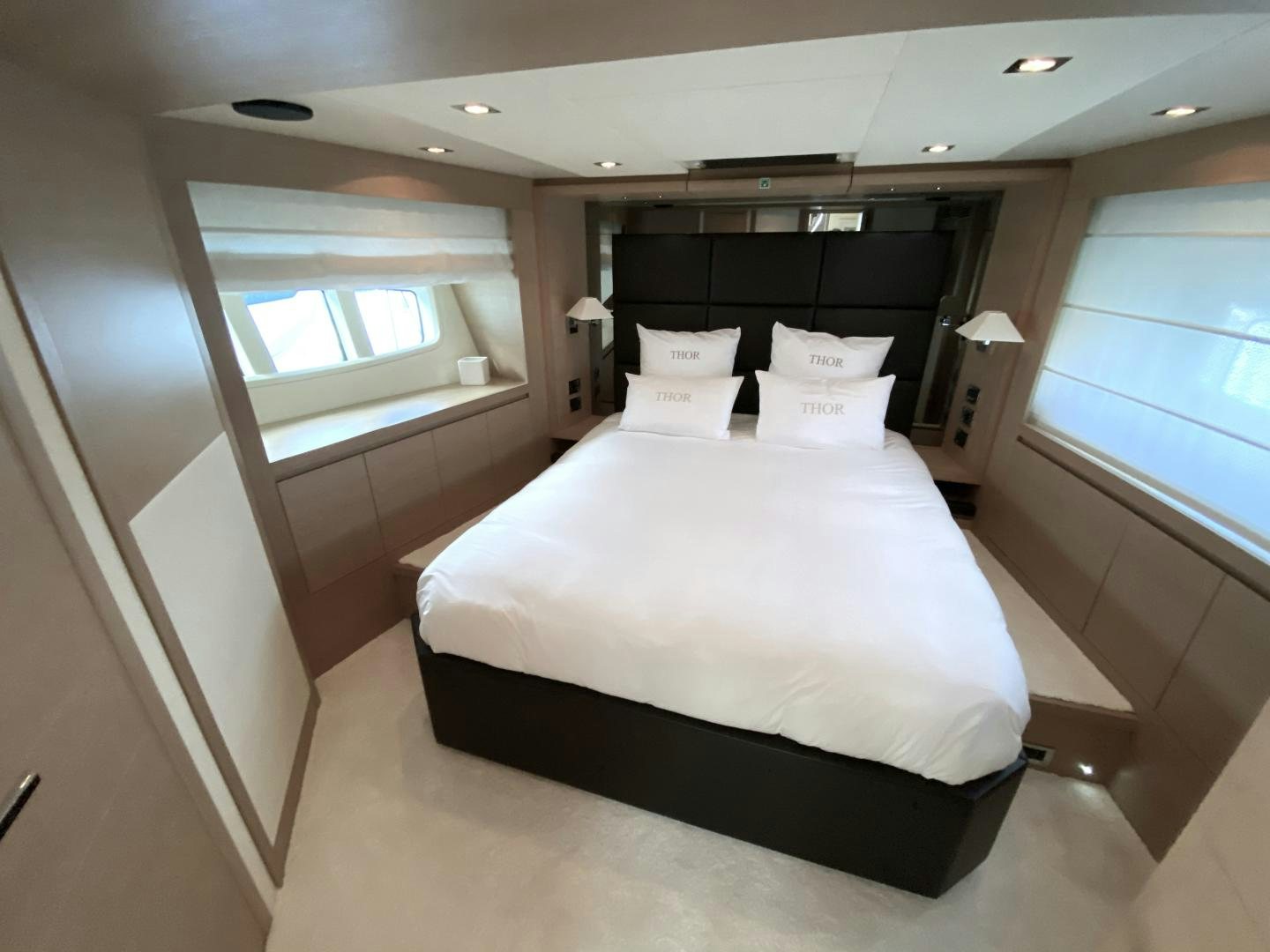 a bed in a room aboard THOR Yacht for Sale