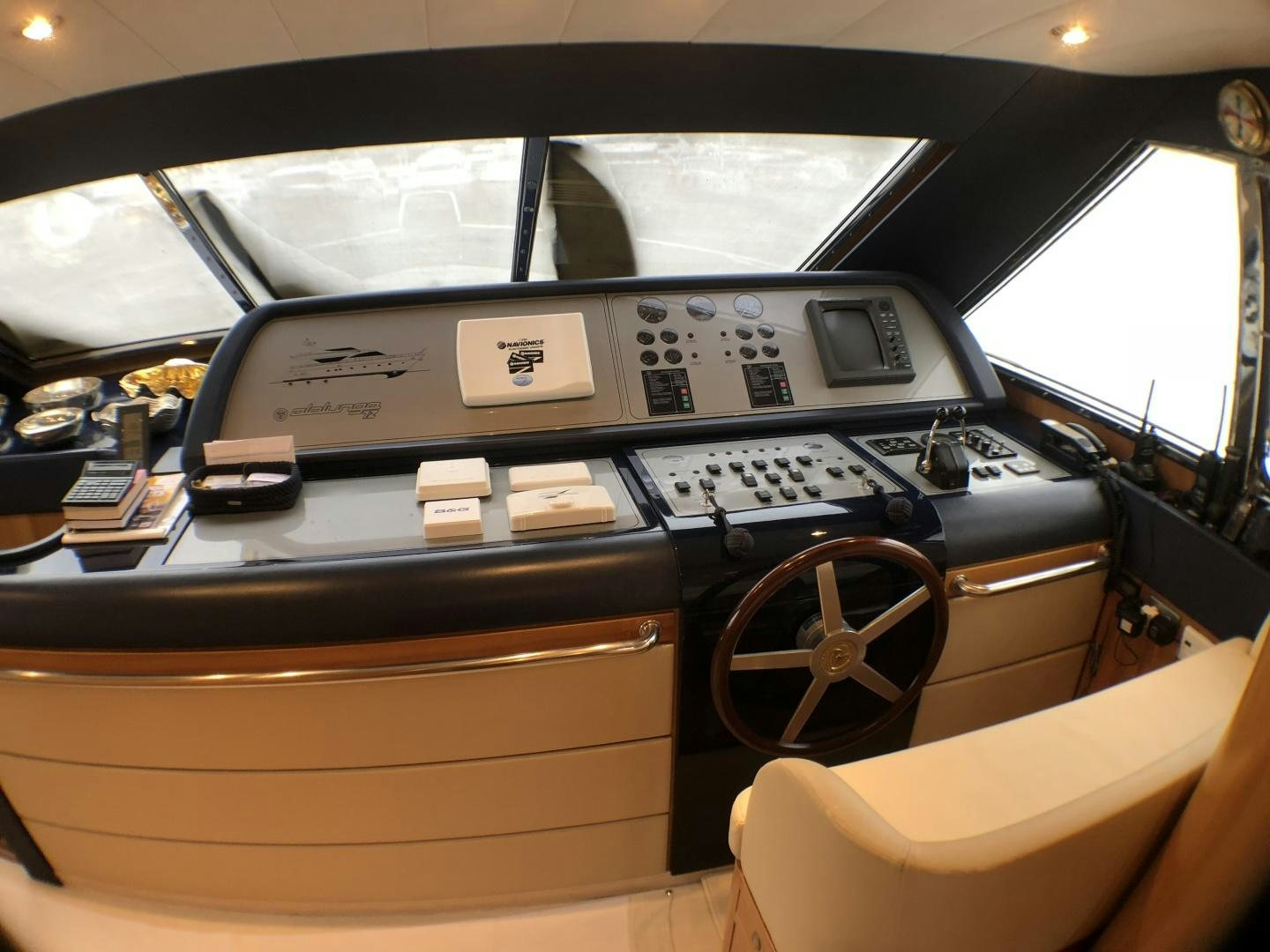 a car with a steering wheel aboard LADY J II Yacht for Sale