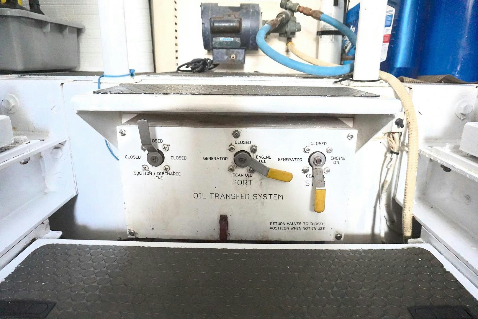 a white machine with a yellow pen aboard CROWN ROYAL Yacht for Sale