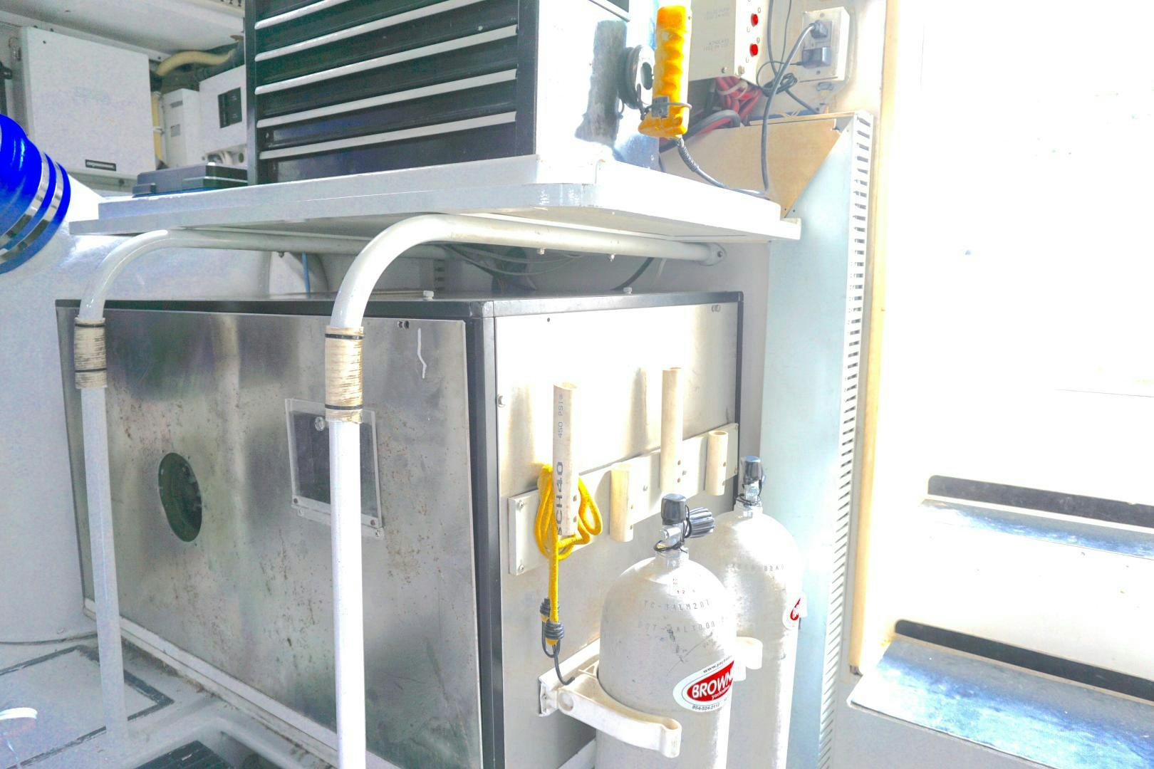 a machine with a metal handle aboard CROWN ROYAL Yacht for Sale