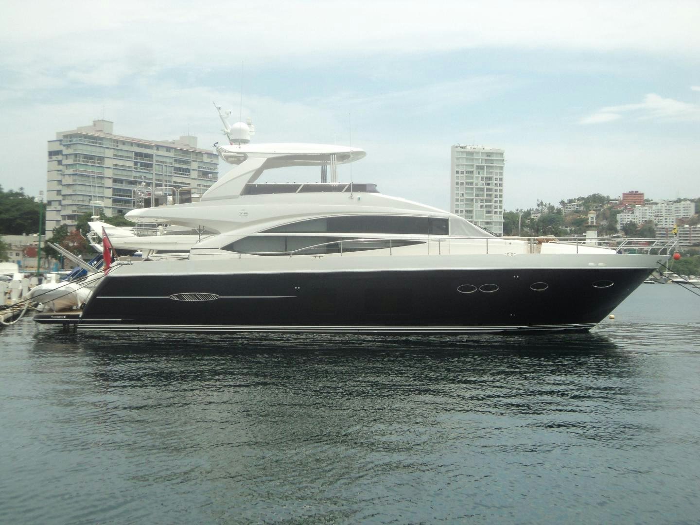 a large white yacht aboard PICHOS III Yacht for Sale