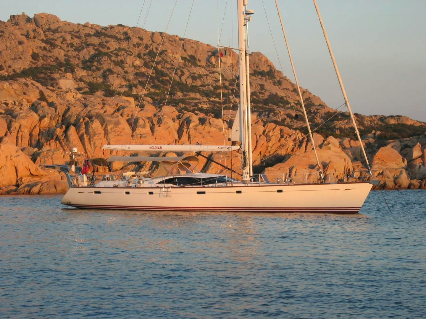 a boat sailing on the water aboard HOLO KAI Yacht for Sale