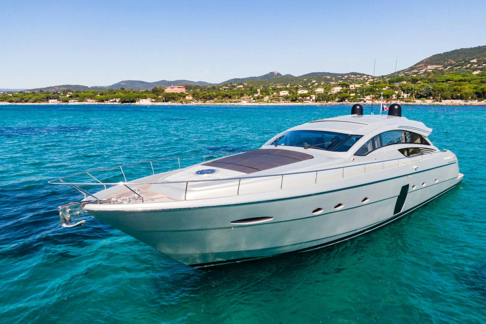 a white yacht in the water aboard LOONEY Yacht for Sale