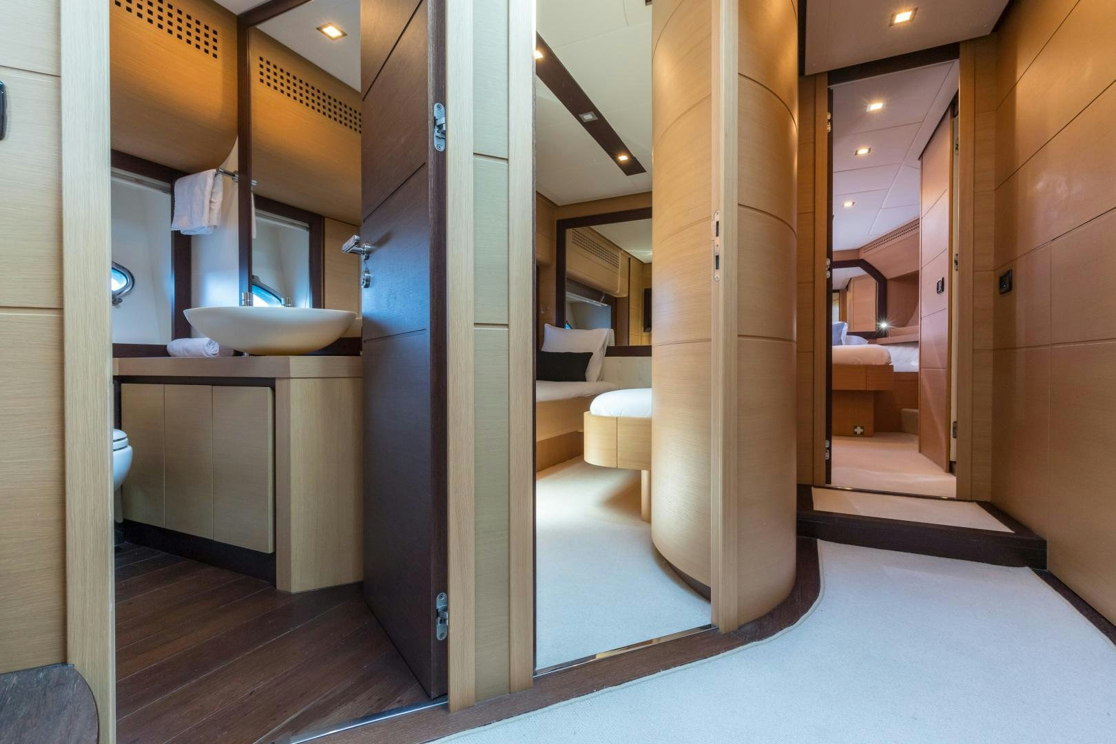 a bathroom with a large glass shower aboard LOONEY Yacht for Sale