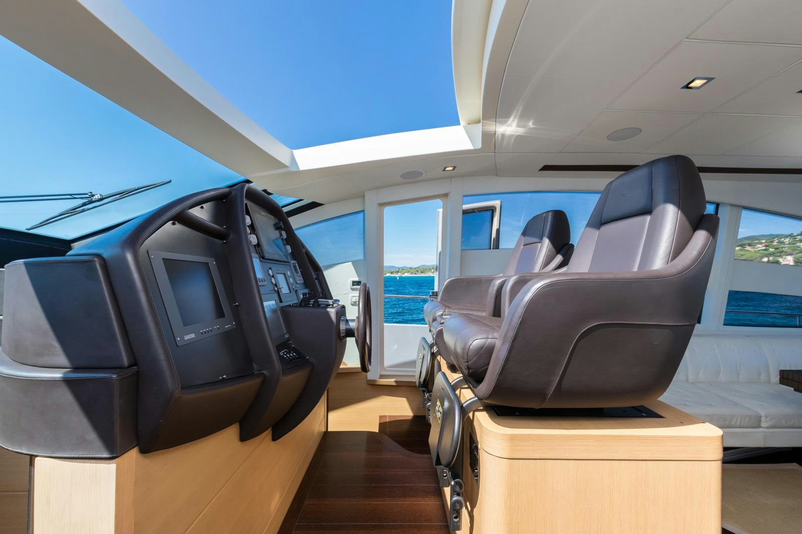 inside of a car aboard LOONEY Yacht for Sale