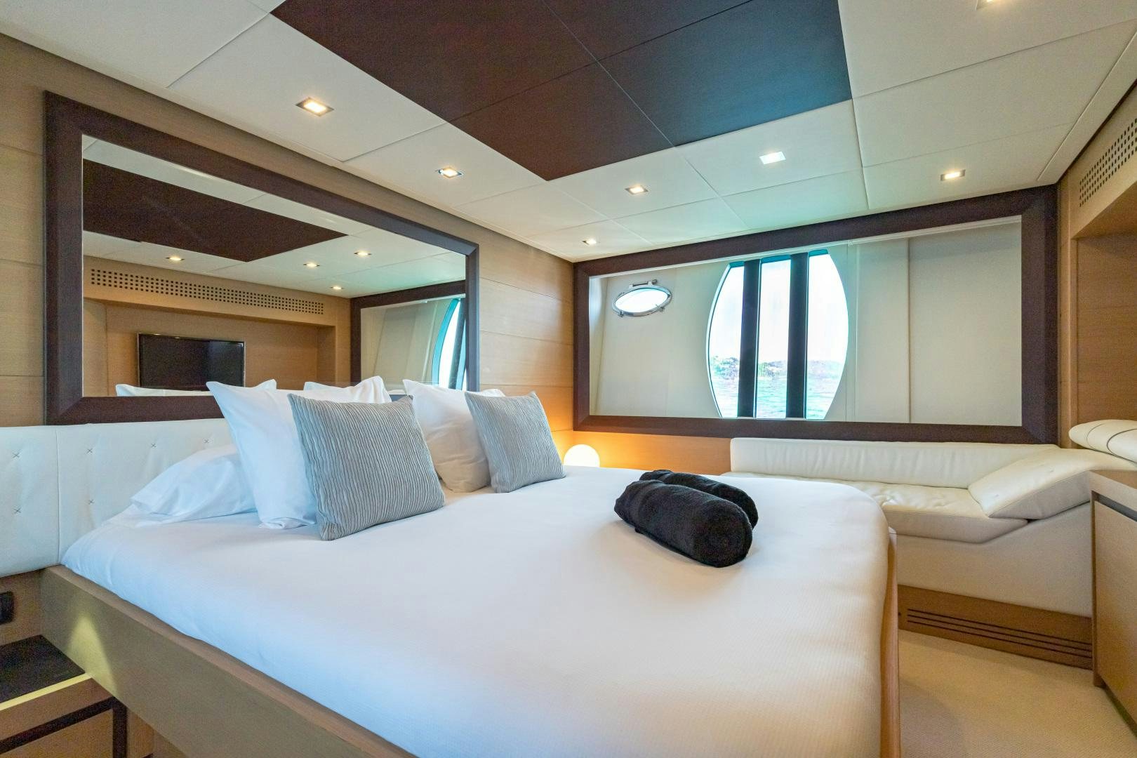 a bed in a room aboard LOONEY Yacht for Sale