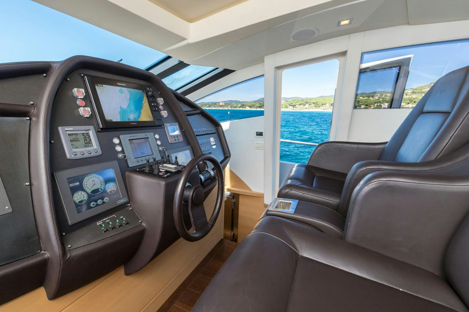 inside of a car aboard LOONEY Yacht for Sale