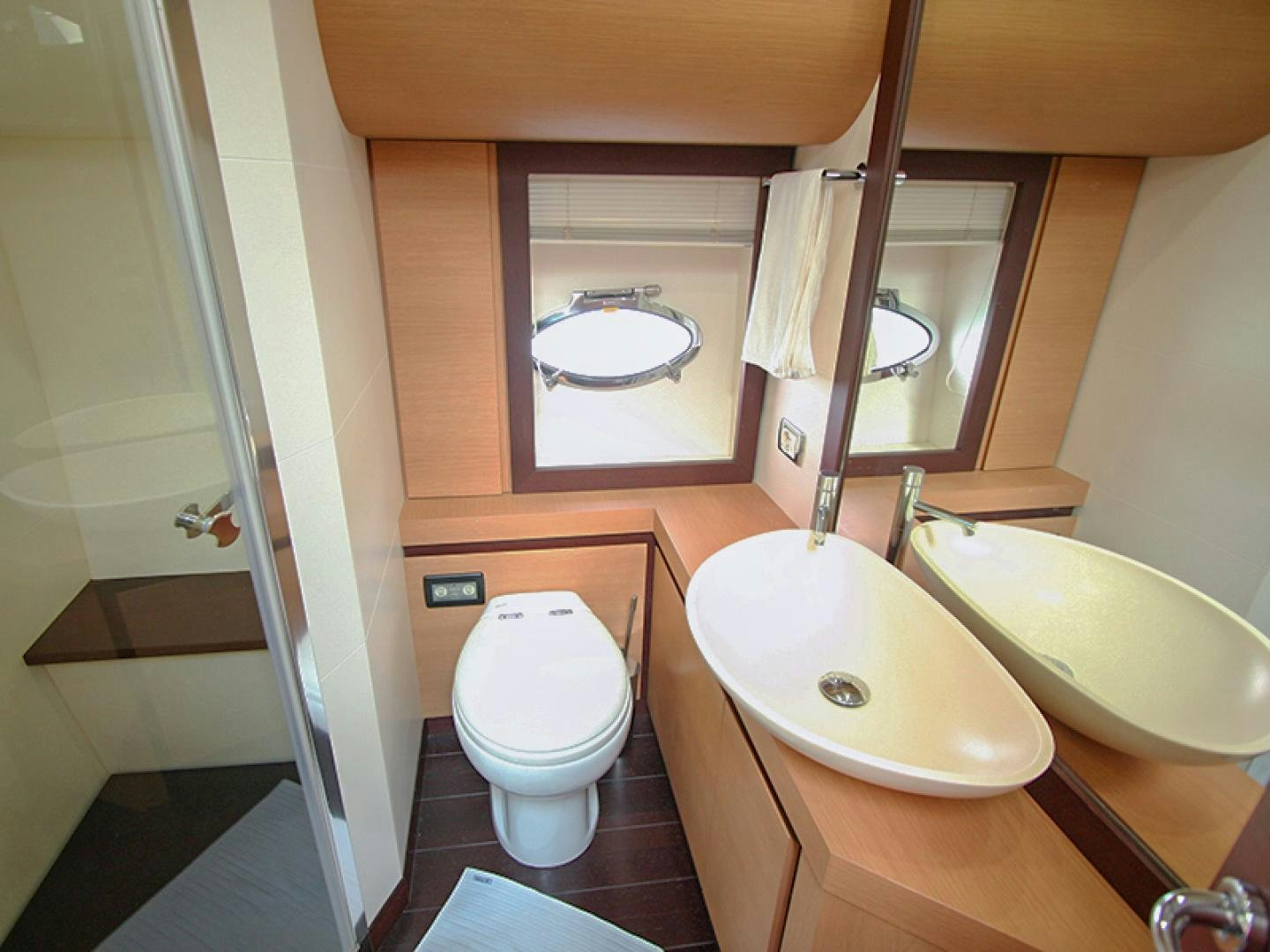 a bathroom with a sink and a toilet aboard TOYZ4BOYZ Yacht for Sale