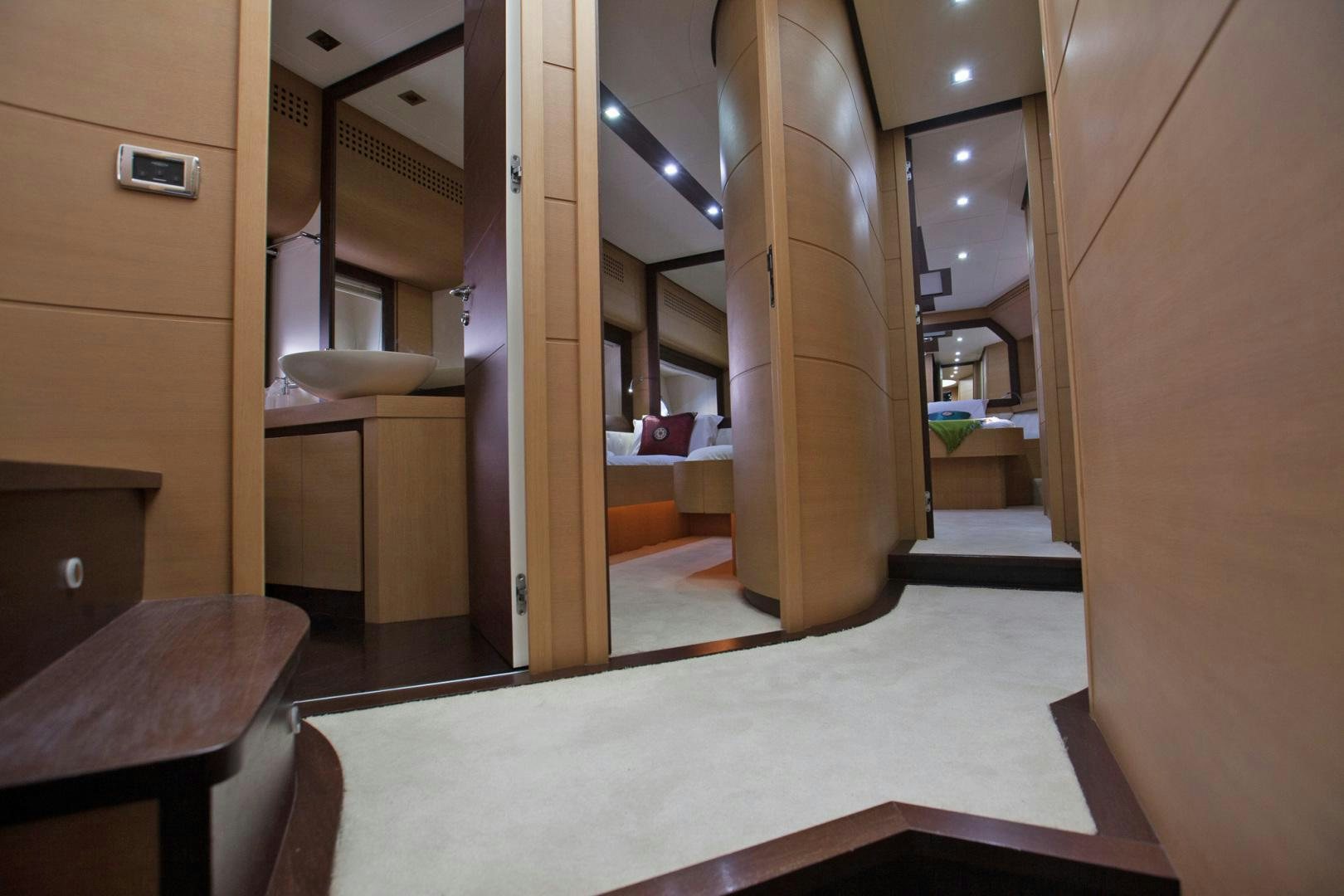 a bathroom with a large mirror aboard TOYZ4BOYZ Yacht for Sale