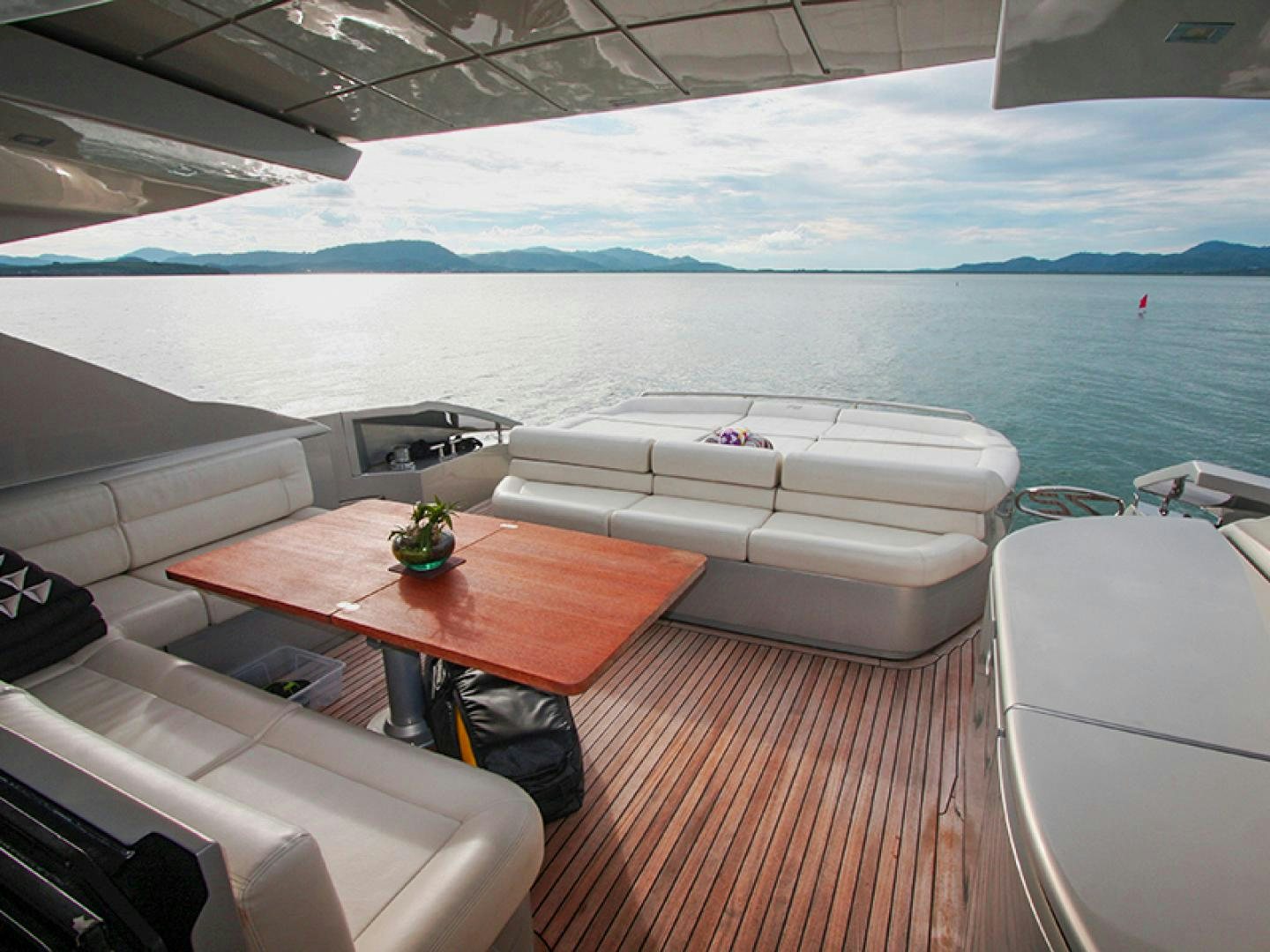 a boat on a deck aboard TOYZ4BOYZ Yacht for Sale