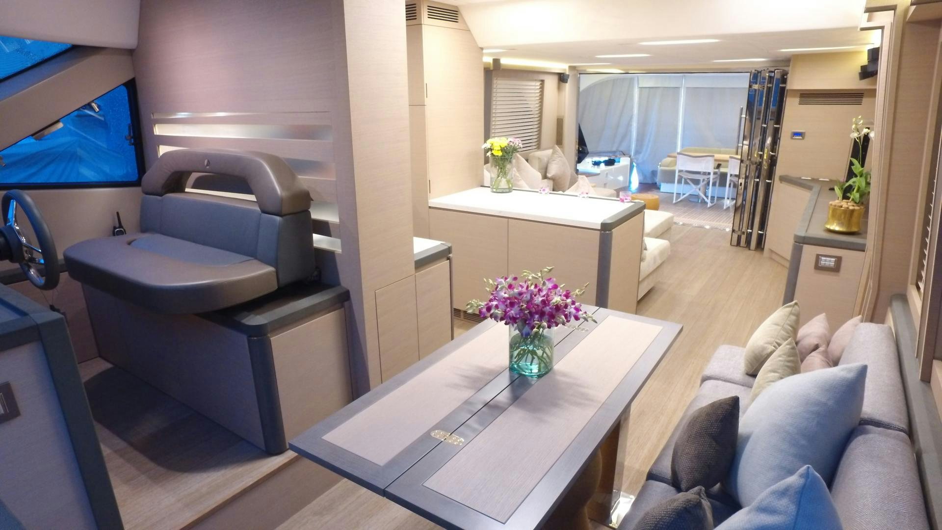 a room with a couch and a table aboard WASANA Yacht for Sale