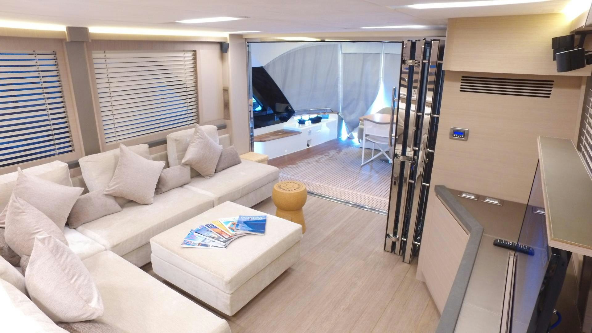 a living room with a large window aboard WASANA Yacht for Sale