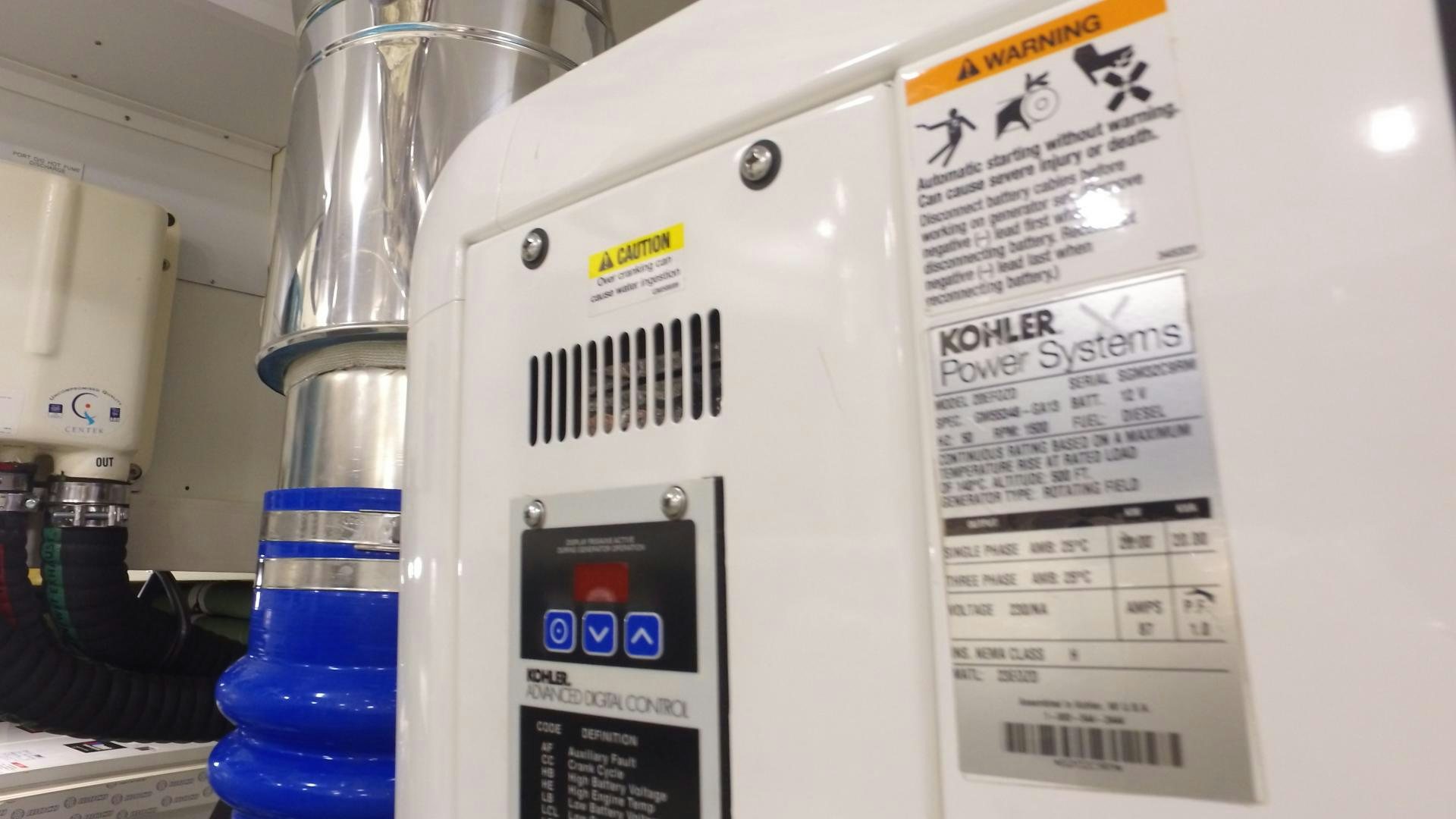 a white machine with a blue label aboard WASANA Yacht for Sale