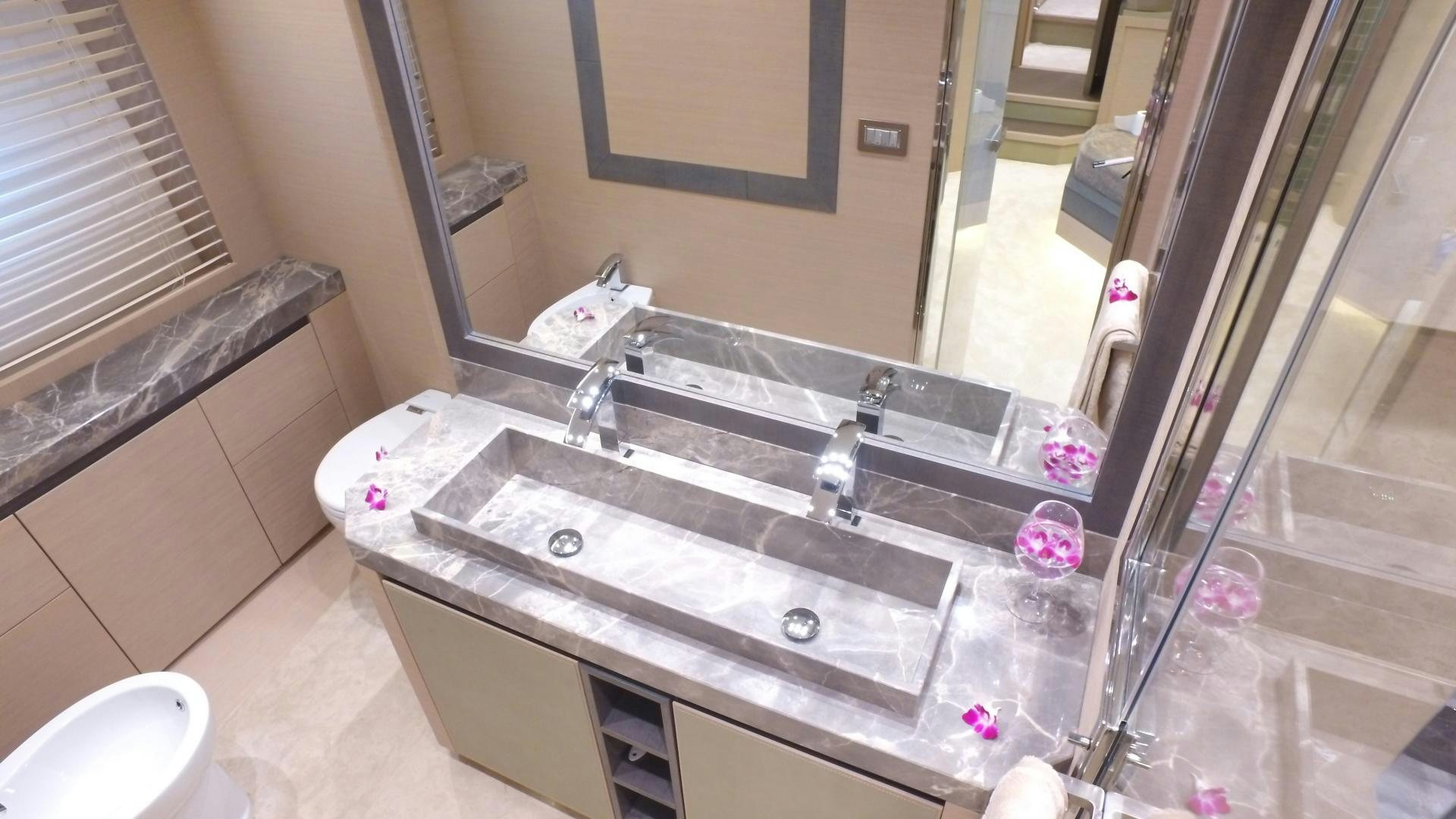 a bathroom with a large countertop aboard WASANA Yacht for Sale