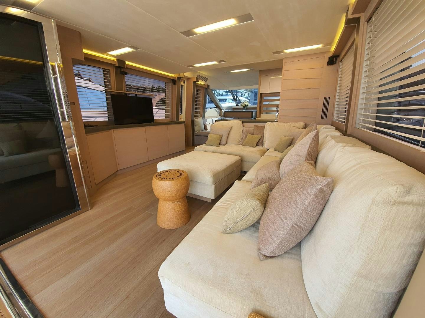 a living room with a couch and a tv aboard WASANA Yacht for Sale
