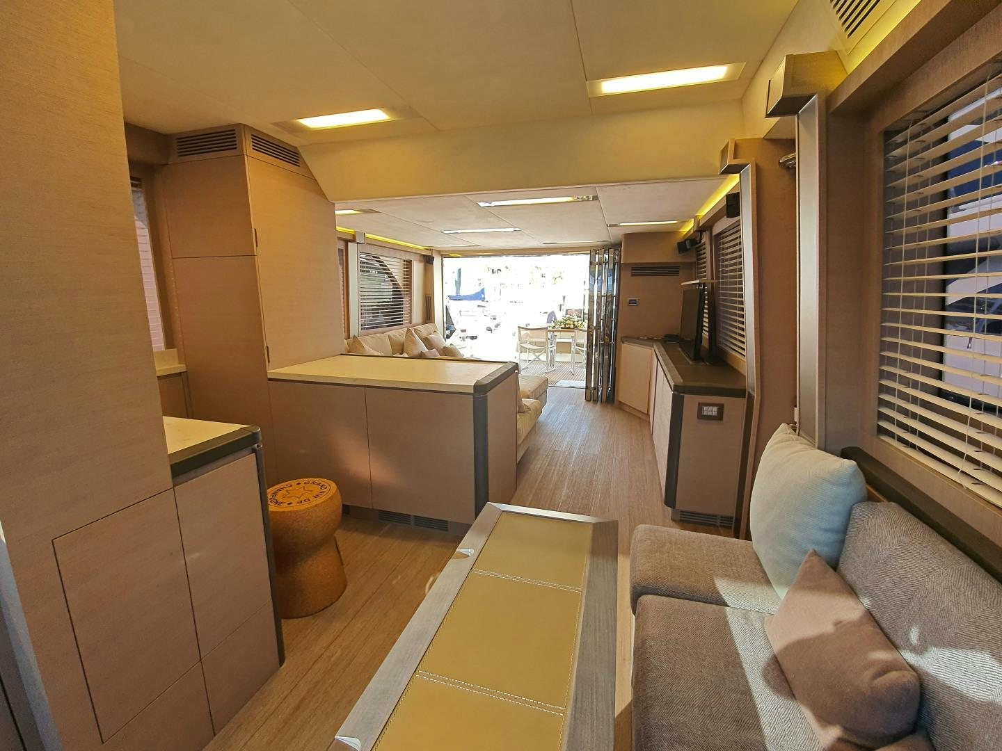 a living room with a couch and a tv aboard WASANA Yacht for Sale