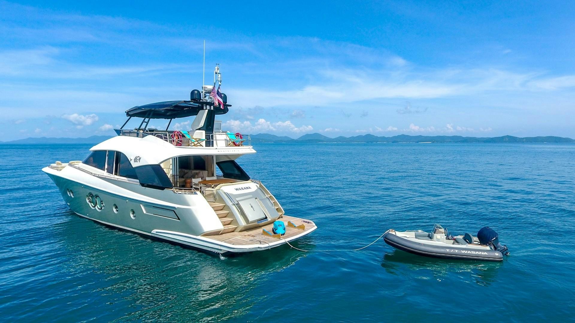 a couple of boats in the water aboard WASANA Yacht for Sale
