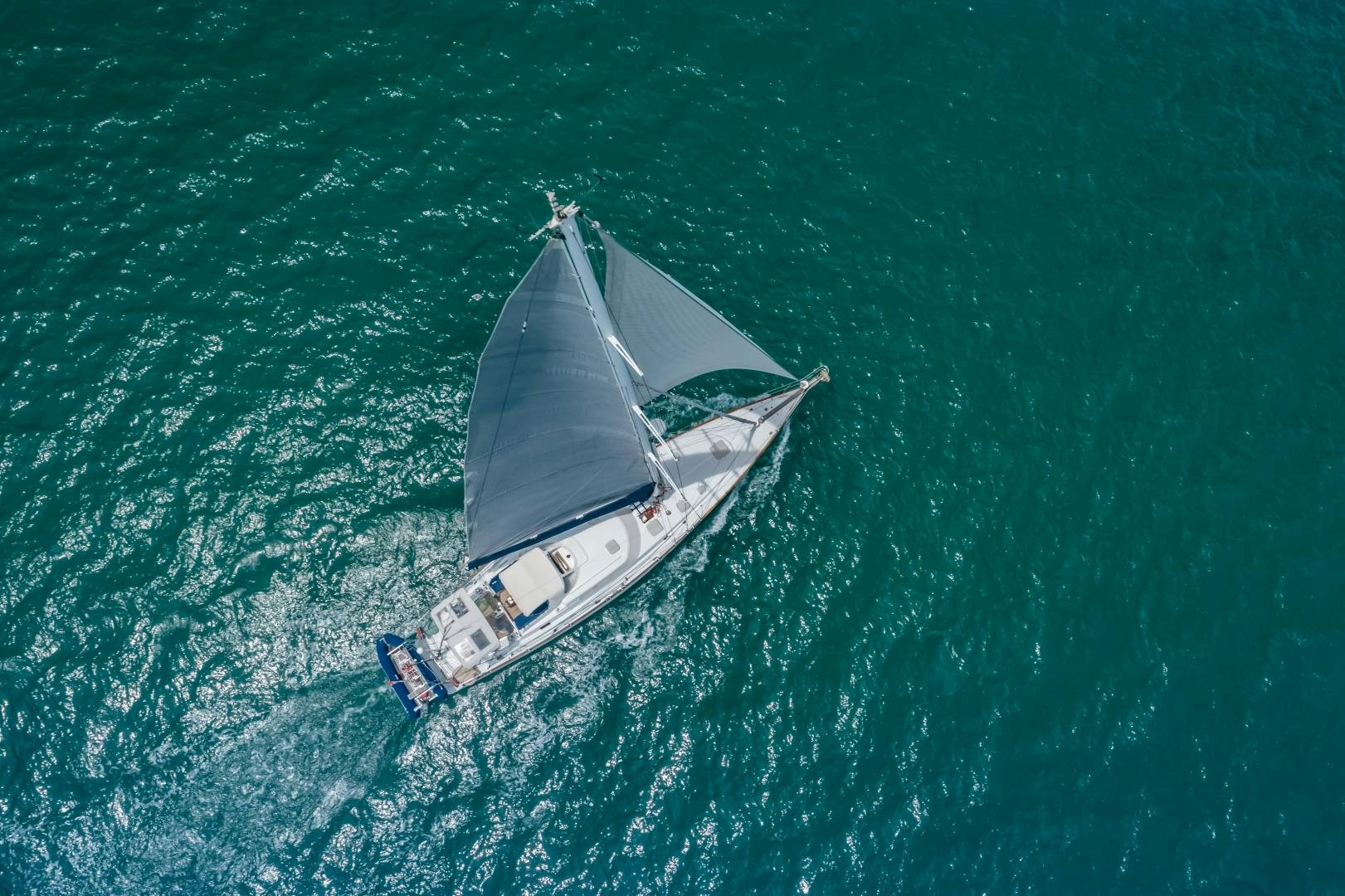 a boat in the ocean aboard MI LIAN  Yacht for Sale