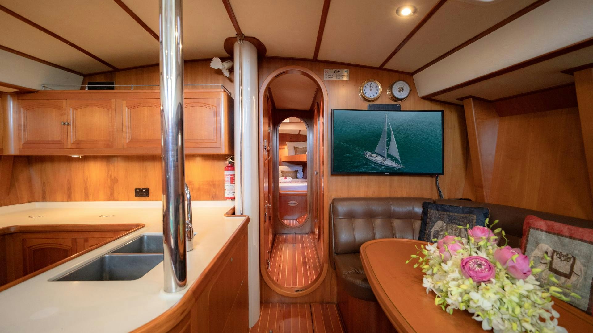 a kitchen with a large glass window aboard MI LIAN  Yacht for Sale