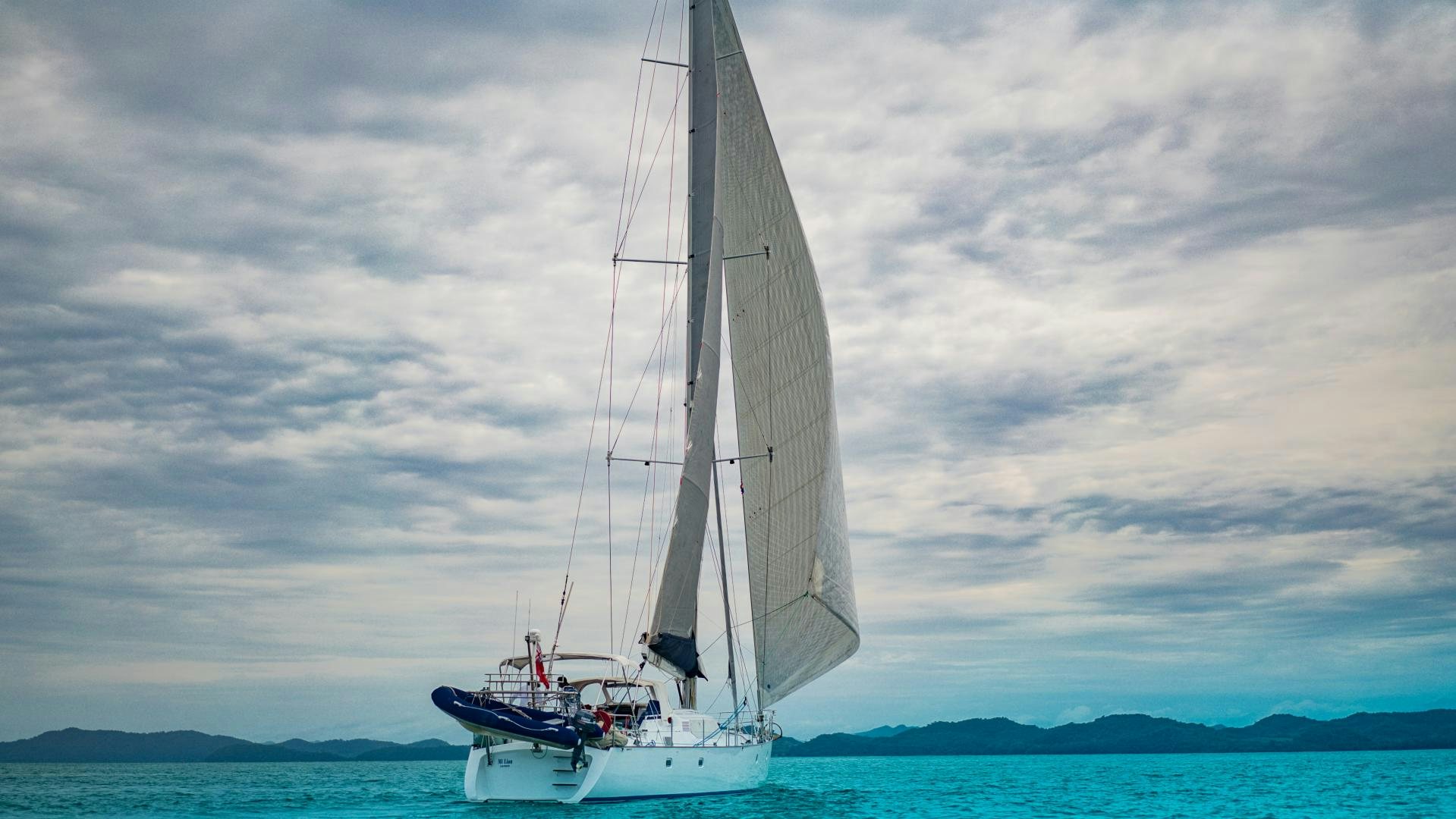 a sailboat on the water aboard MI LIAN  Yacht for Sale