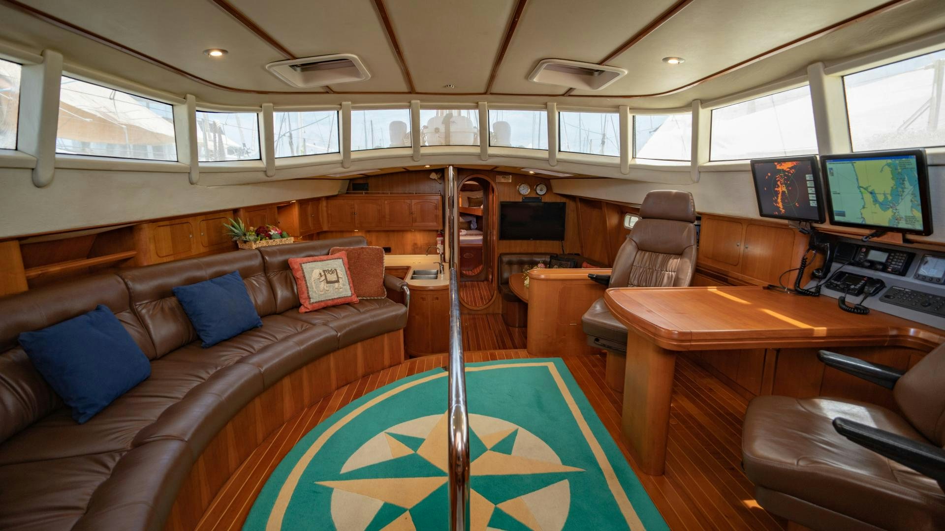 a room with a pool table and couches aboard MI LIAN  Yacht for Sale