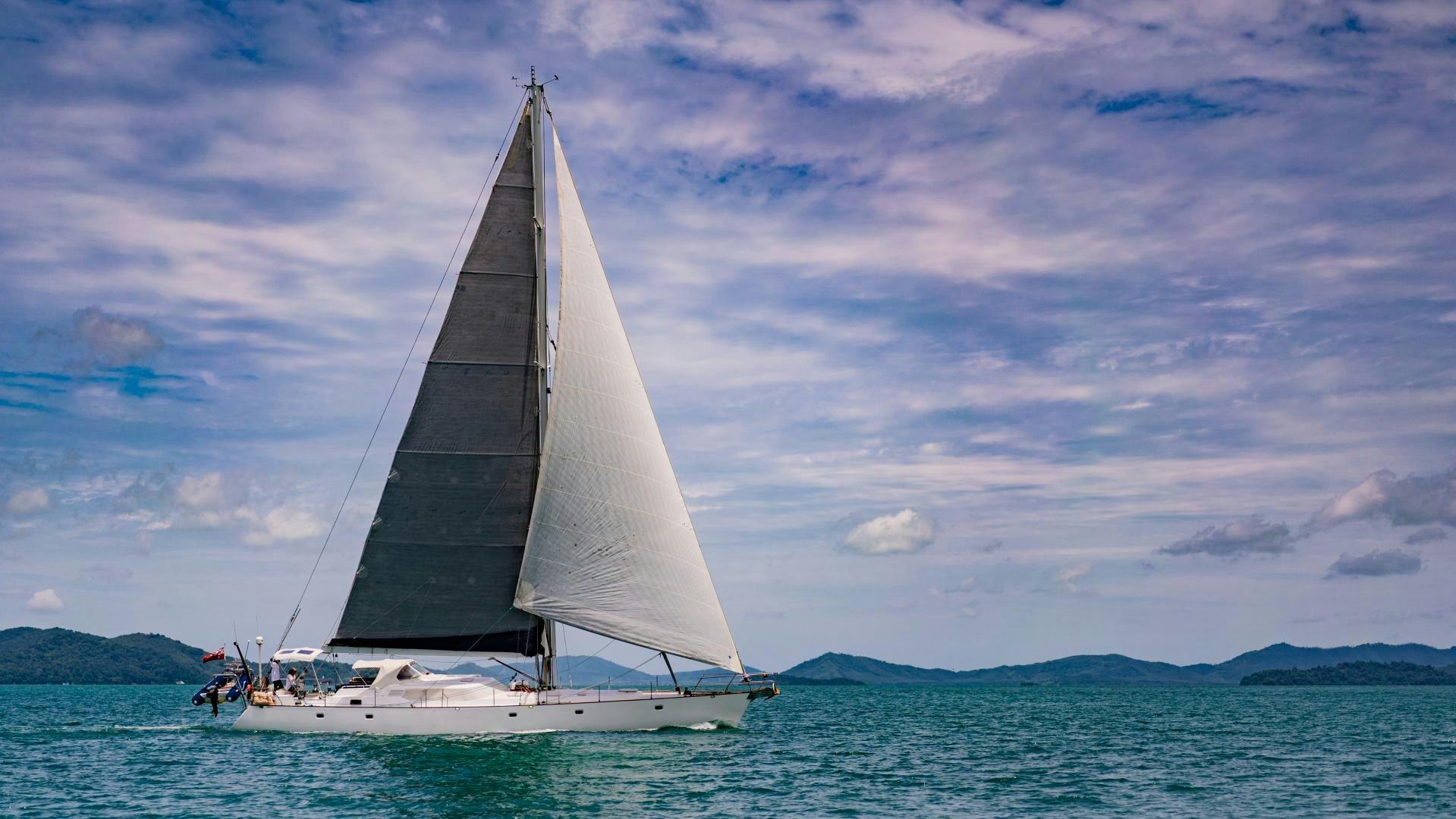 a sailboat on the water aboard MI LIAN  Yacht for Sale