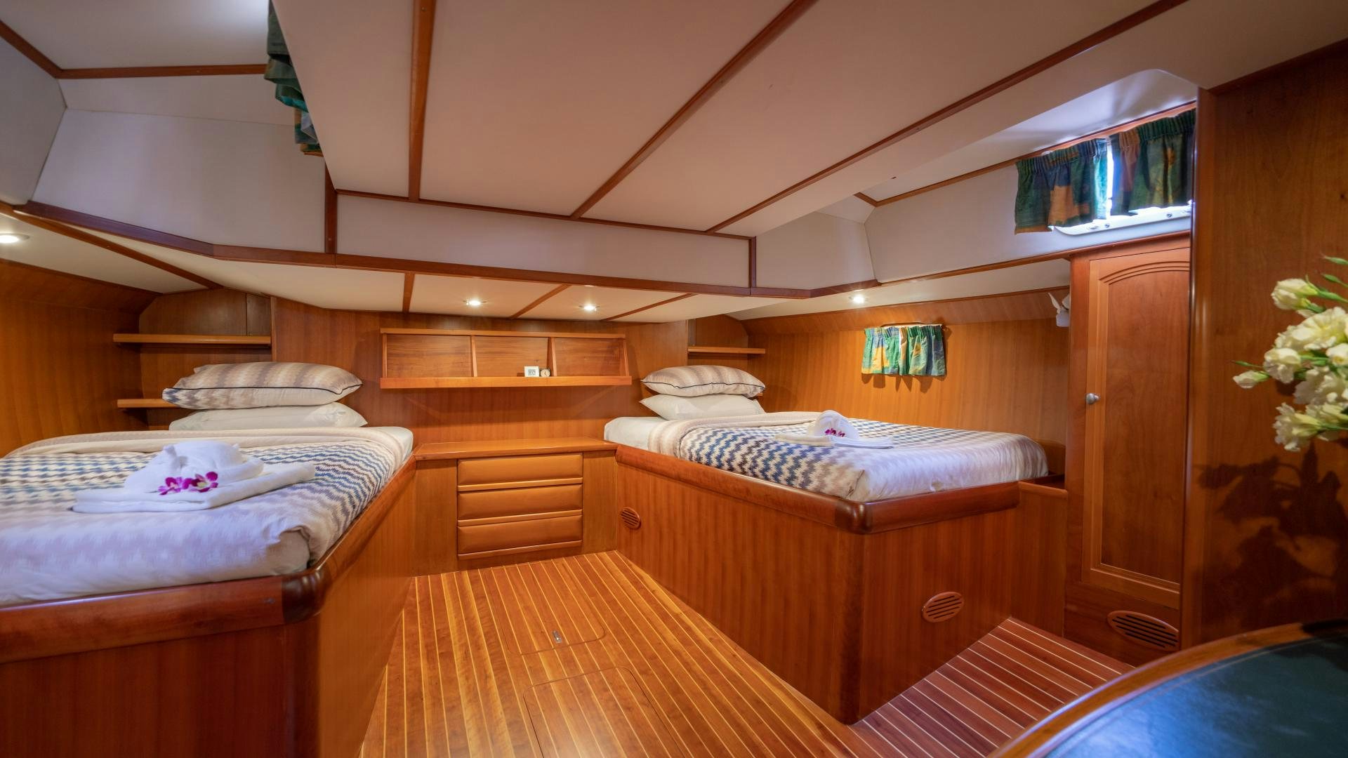 a room with wooden furniture aboard MI LIAN  Yacht for Sale