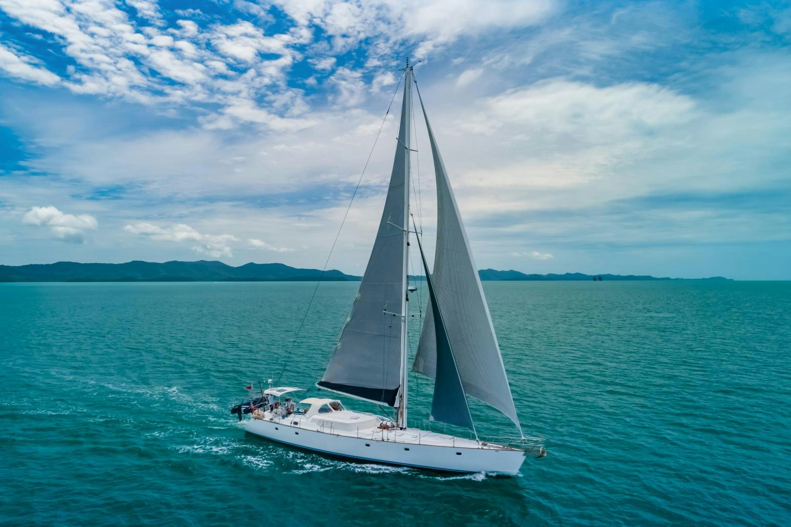a sailboat in the water aboard MI LIAN  Yacht for Sale