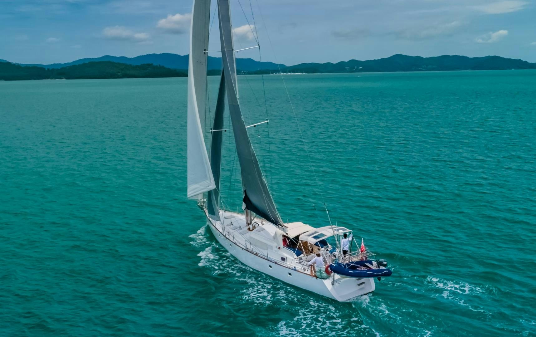 a boat sailing on the sea aboard MI LIAN  Yacht for Sale