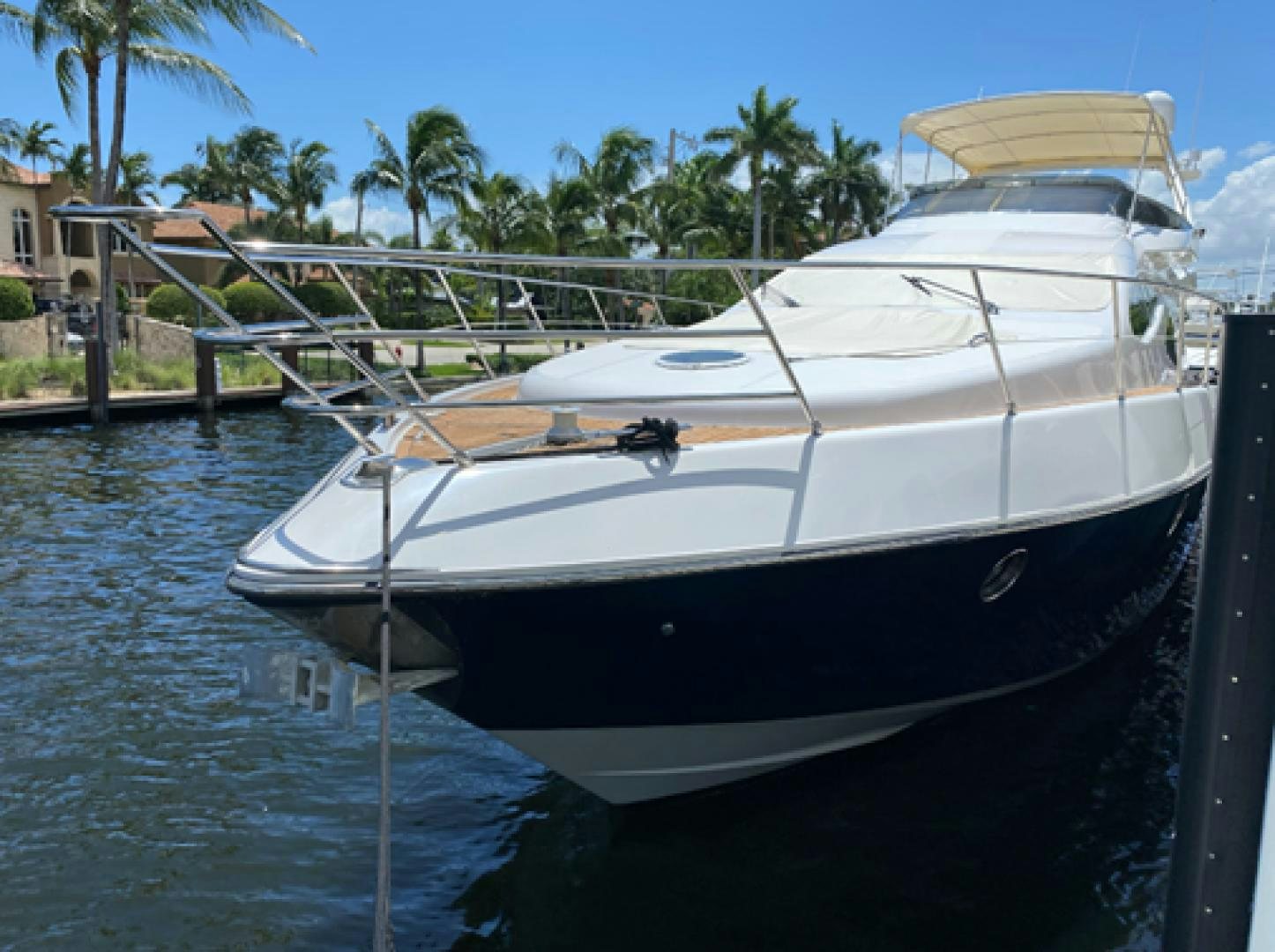 a boat docked at a pier aboard EUROPA Yacht for Sale