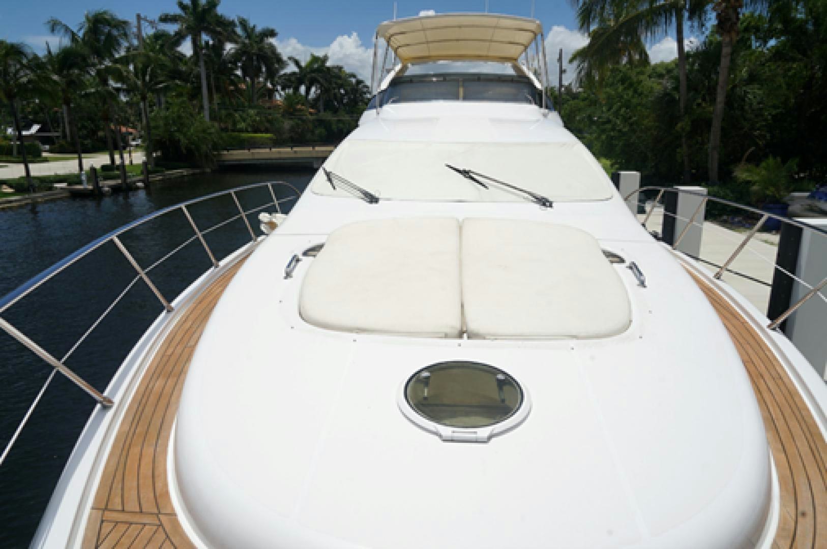a white boat in a pool aboard EUROPA Yacht for Sale