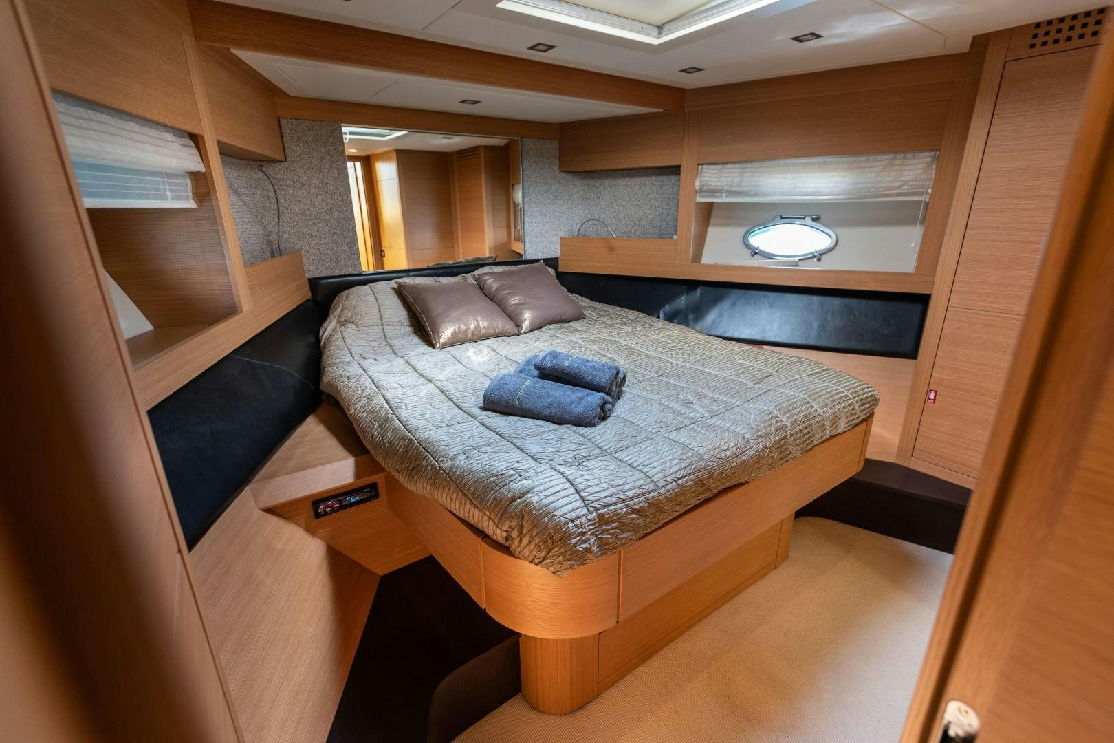a bed in a room aboard FIRST LADY Yacht for Sale