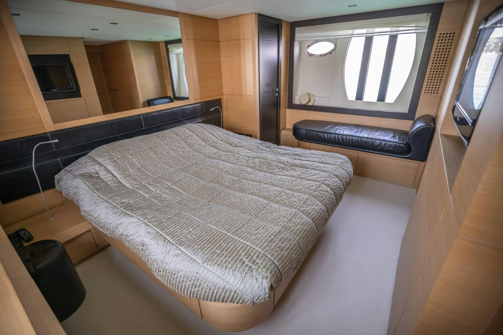 a bed in a room aboard FIRST LADY Yacht for Sale