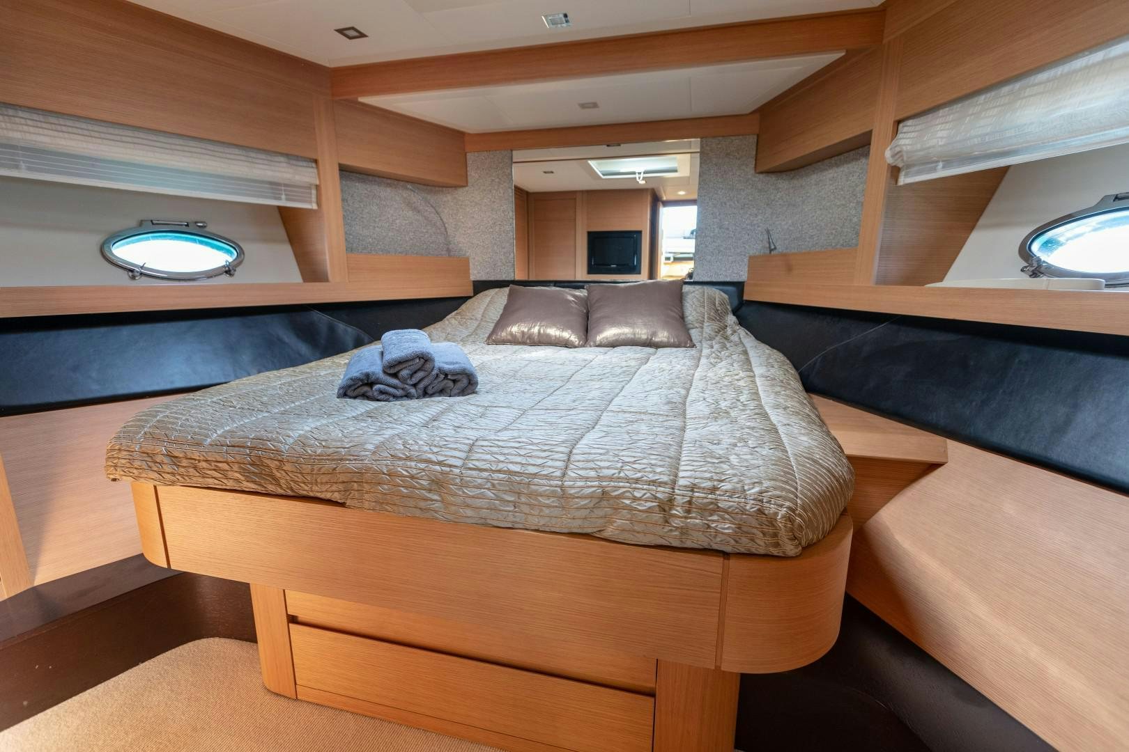 a bed in a room aboard FIRST LADY Yacht for Sale