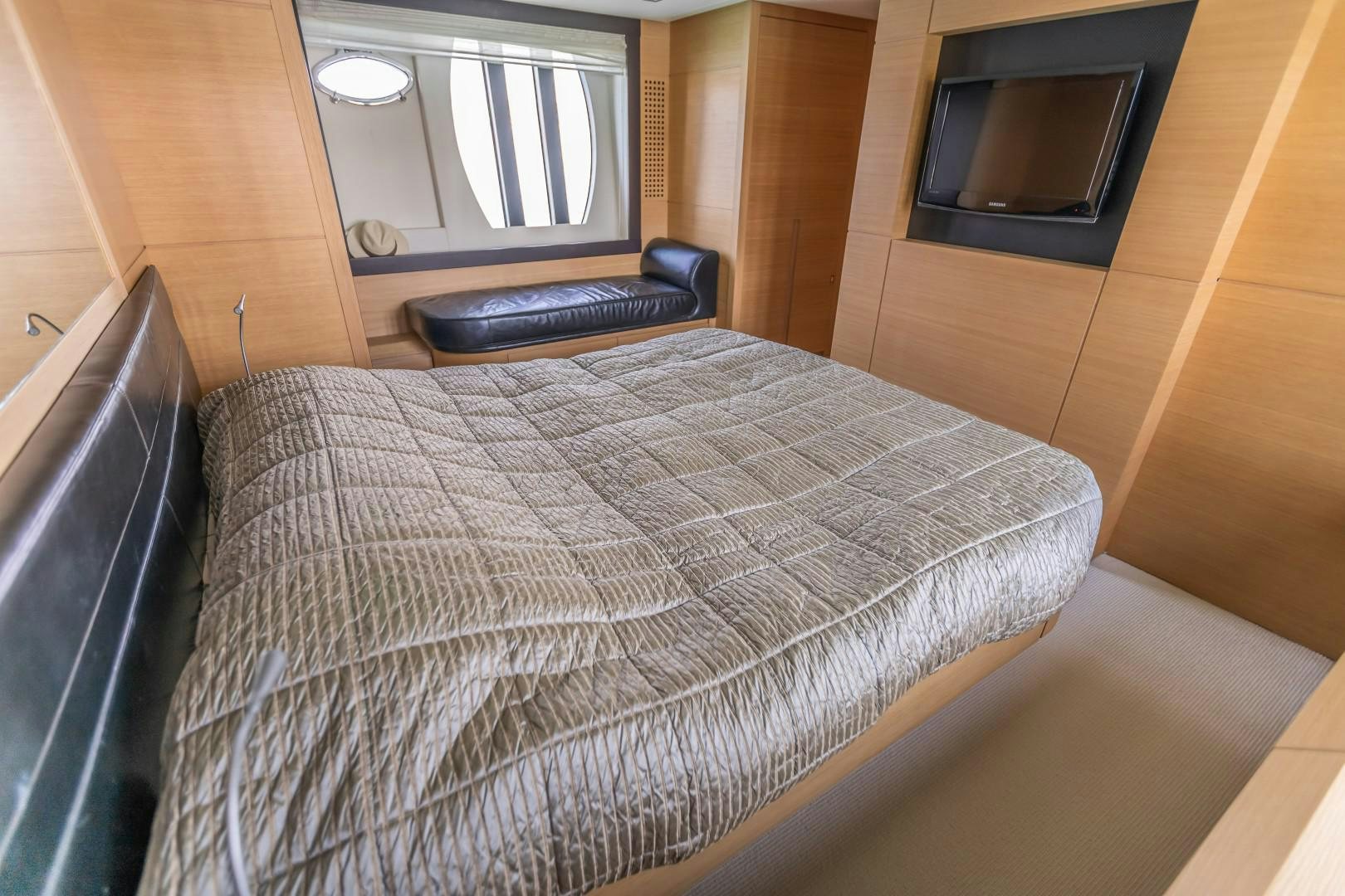 a bed in a room aboard FIRST LADY Yacht for Sale