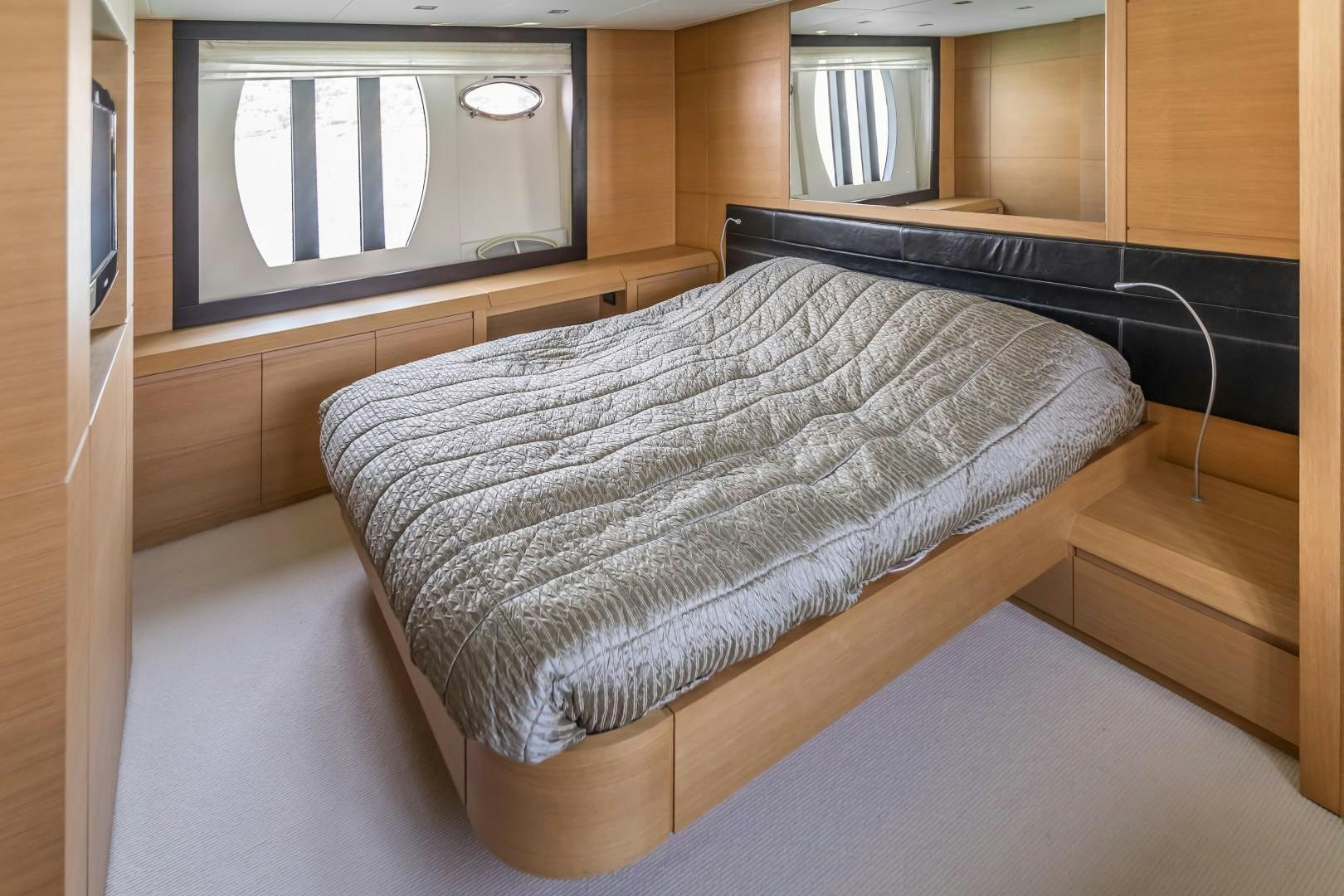 a bed in a room aboard FIRST LADY Yacht for Sale