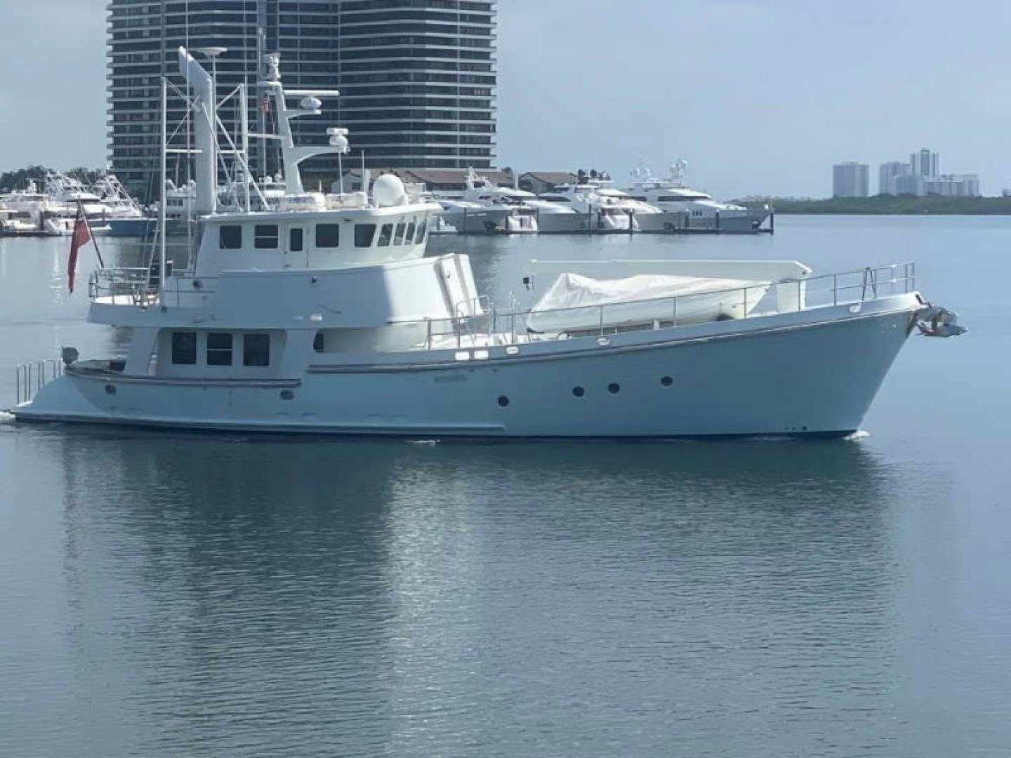 a large white boat in the water aboard RHINO 1 Yacht for Sale