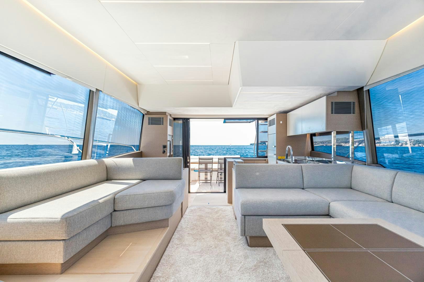 a living room with a large window aboard LA HUNE 4.0 Yacht for Sale