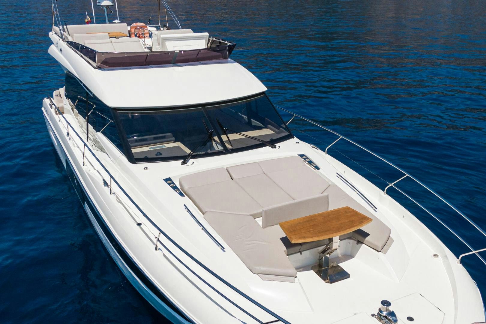 a white yacht on the water aboard LA HUNE 4.0 Yacht for Sale