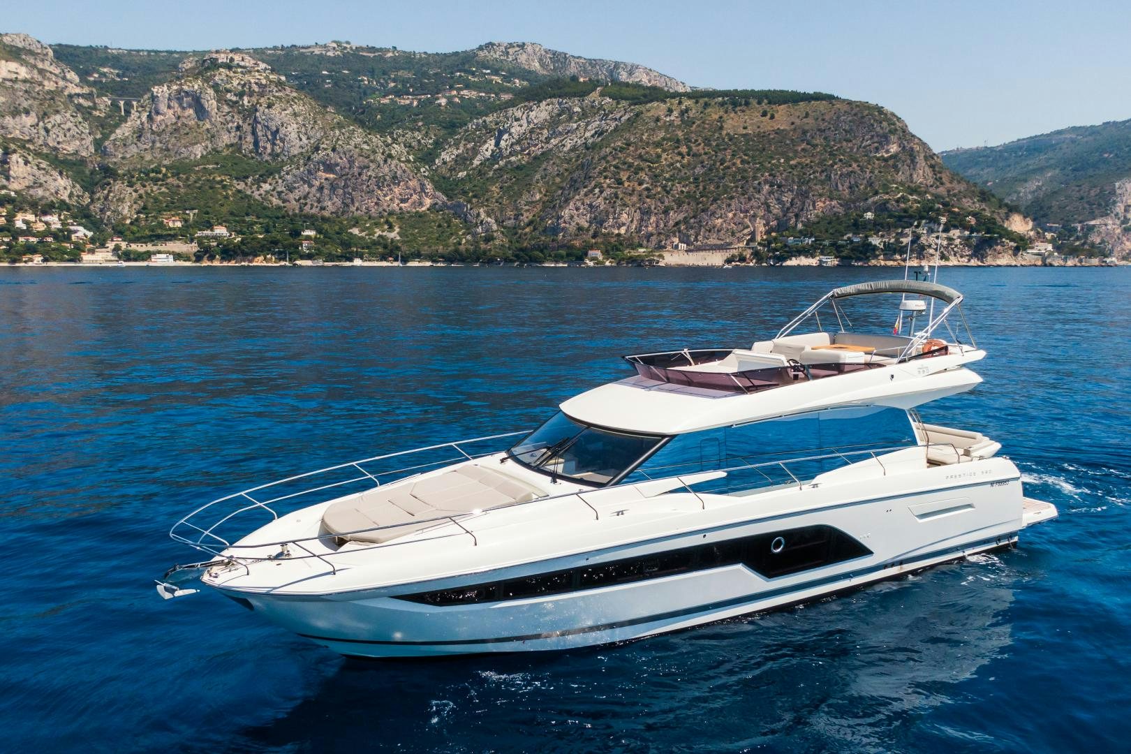 a white boat in the water aboard LA HUNE 4.0 Yacht for Sale