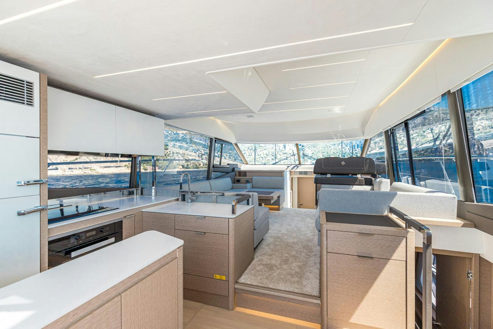 inside of a vehicle with a large window and a view of the water aboard LA HUNE 4.0 Yacht for Sale